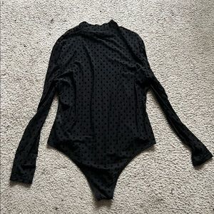 Black polka dot bodysuit